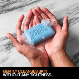 REDKEN BREWS CLEANSING BAR IN HAND