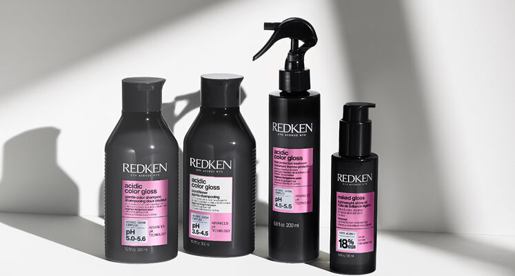 Redken Acidic Color Gloss. A line of hair care products including shampoo, conditioner, and leave-in conditioner.