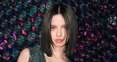 Redken Acidic Color Gloss. A line of hair care products including shampoo, conditioner, and leave-in conditioner.