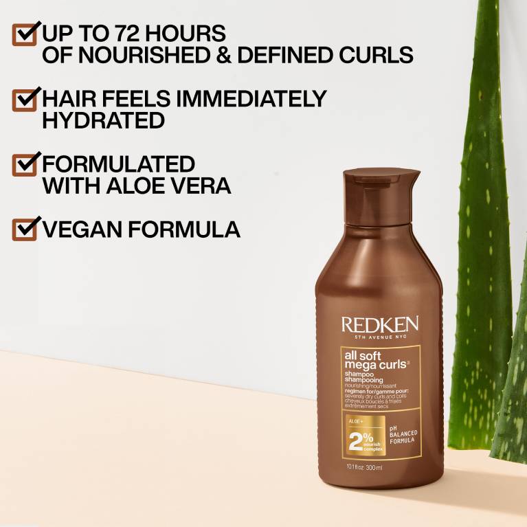 Redken All Soft Mega Curl shampoo for curly hair bottle image with text containing a list of hair benefits including up top 72 hours of nourished and defined curls, hair feels immediately hydrated, formulated with aloe vera, vegan formula, for healthier hair results.