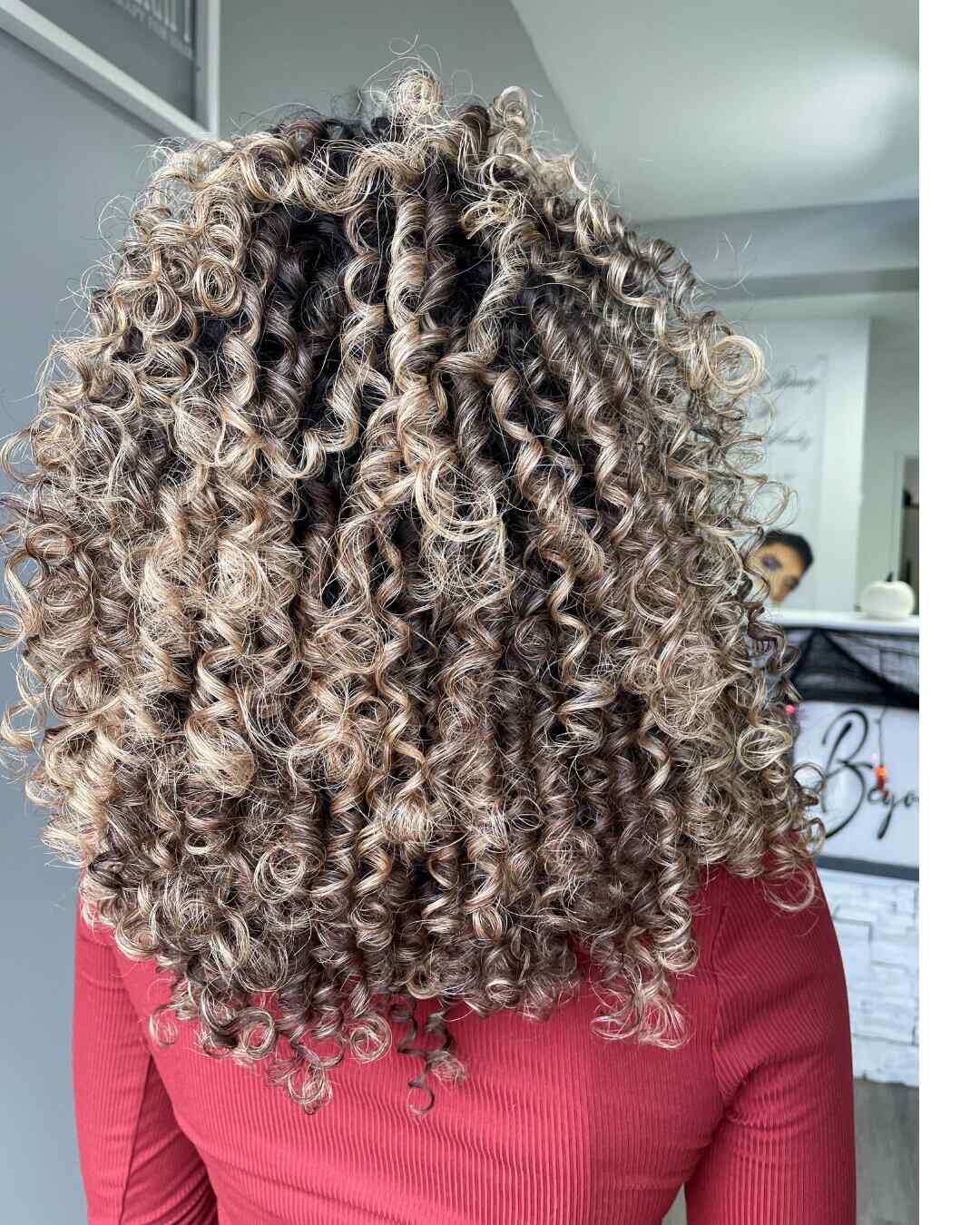 Lived-In Curly Blonde Hair Color by Redken