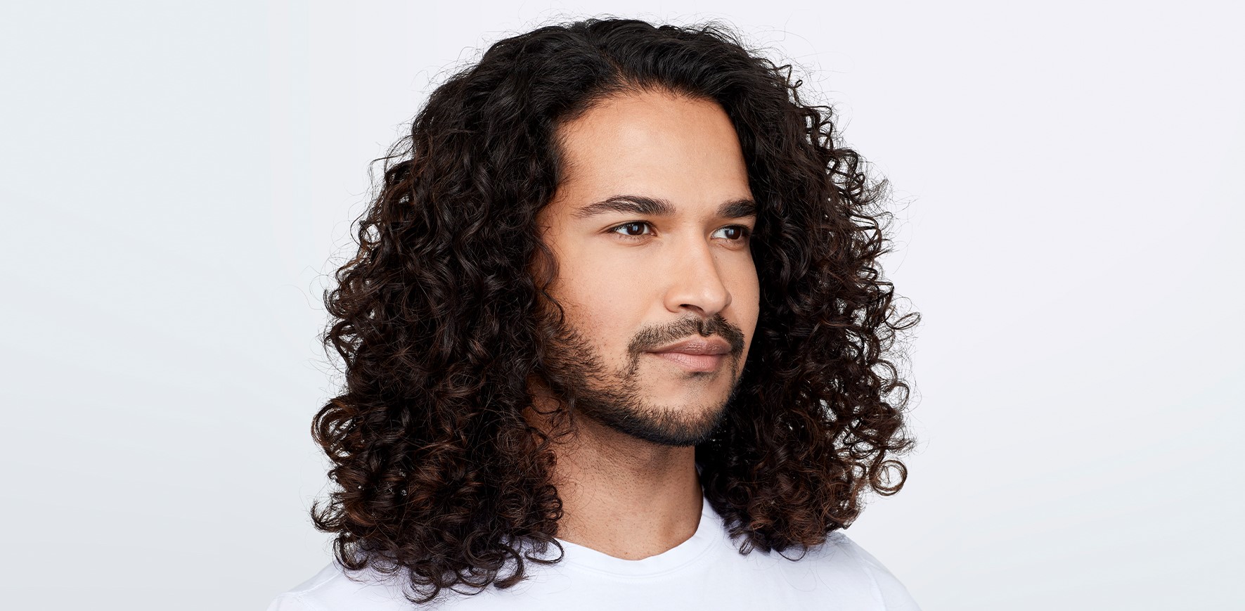 Redken Brews Male Model with Beard and Long Hair