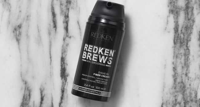 Discover Redken Brews Dishevel Fiber Cream for men's hair buns